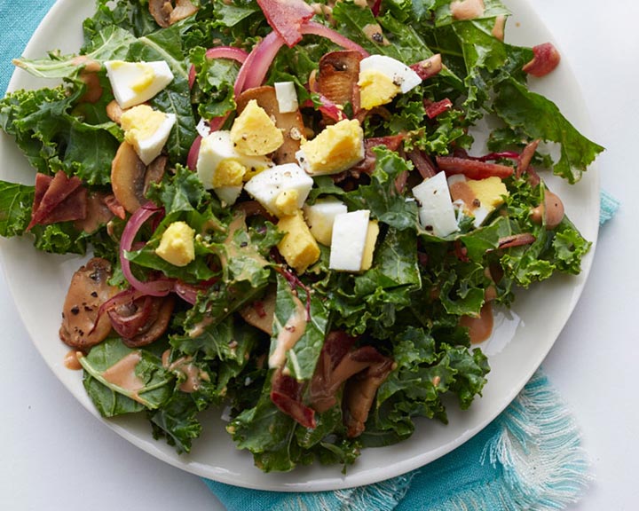Kale salad with warm bacon dressing